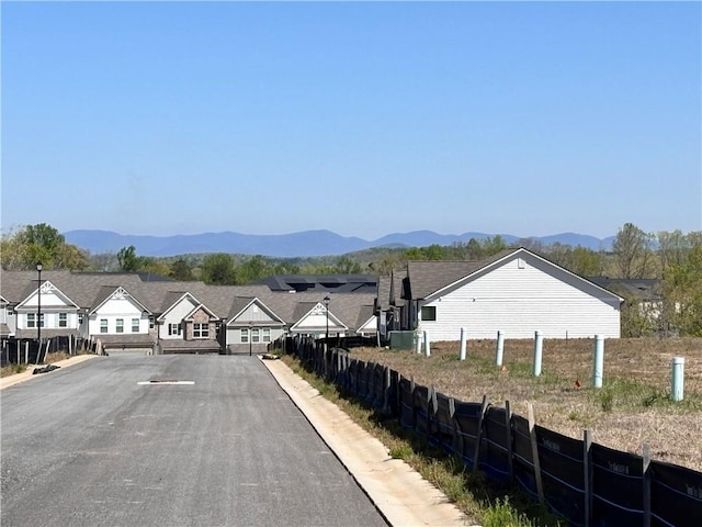 3817 Billabong Trl Unit 104, Gainesville, GA 30506 - view of street featuring a mountain view, curbs, and a residential view