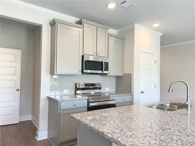 3817 Billabong Trl Unit 104, Gainesville, GA 30506 - kitchen featuring gray cabinets, a sink, visible vents, and stainless steel appliances