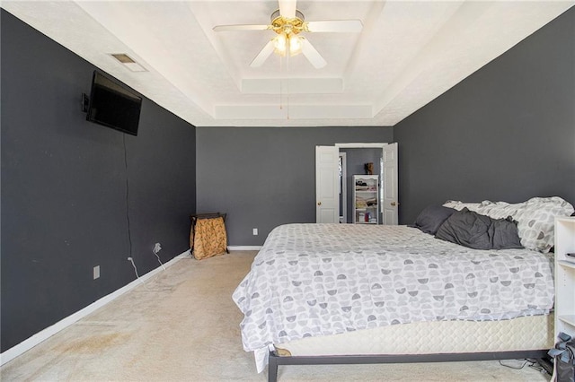 7341 Raleigh Way, Bethlehem, GA 30620 - bedroom with a raised ceiling, light carpet, baseboards, and a ceiling fan