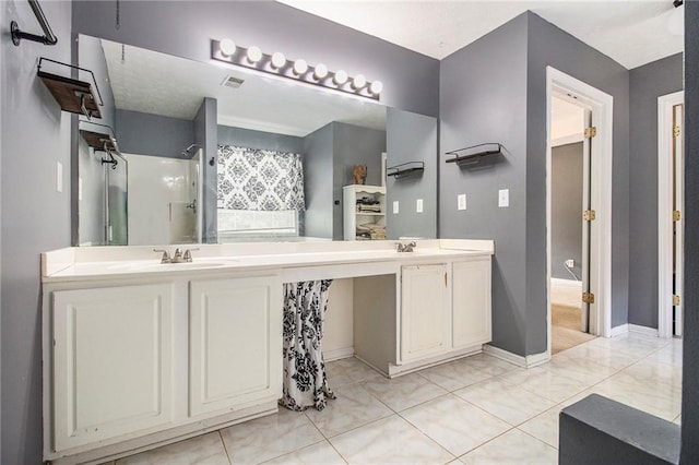 7341 Raleigh Way, Bethlehem, GA 30620 - bathroom featuring double vanity, a shower, and baseboards