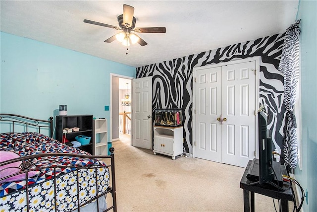7341 Raleigh Way, Bethlehem, GA 30620 - bedroom featuring light colored carpet, wallpapered walls, a closet, and a ceiling fan