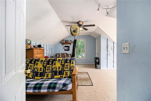 7341 Raleigh Way, Bethlehem, GA 30620 - bedroom featuring vaulted ceiling, carpet flooring, track lighting, and a ceiling fan
