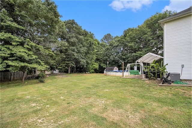 7341 Raleigh Way, Bethlehem, GA 30620 - view of yard with central AC unit