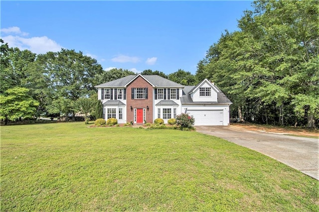 7341 Raleigh Way, Bethlehem, GA 30620 - colonial inspired home featuring driveway, a garage, a front yard, and brick siding