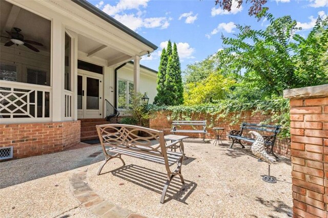 596 E Lake Dr, Gainesville, GA 30506 - view of patio / terrace with a ceiling fan, fence, and entry steps