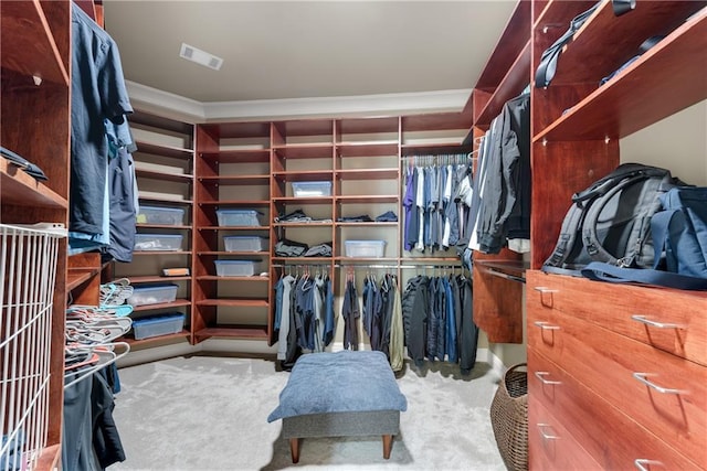 walk in closet with carpet floors and visible vents