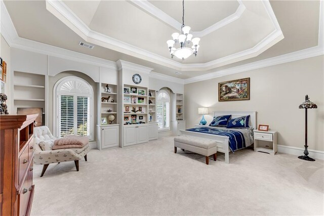 bedroom featuring a raised ceiling, carpet, ornamental molding, and a chandelier