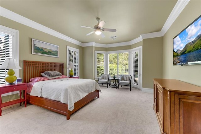 bedroom with crown molding, multiple windows, light carpet, and ceiling fan