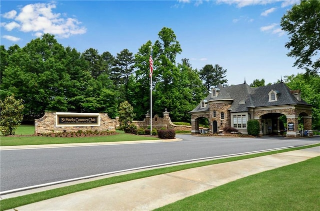 view of road featuring sidewalks and curbs