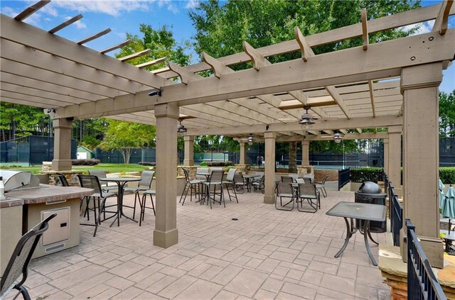 view of patio with a pergola and ceiling fan