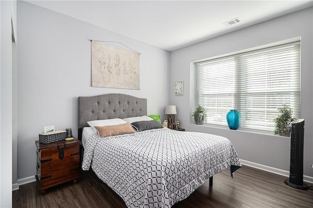 bedroom featuring dark hardwood / wood-style floors