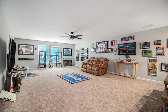 playroom featuring ceiling fan and carpet flooring