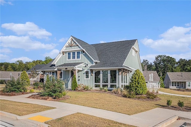 view of front facade featuring a front yard