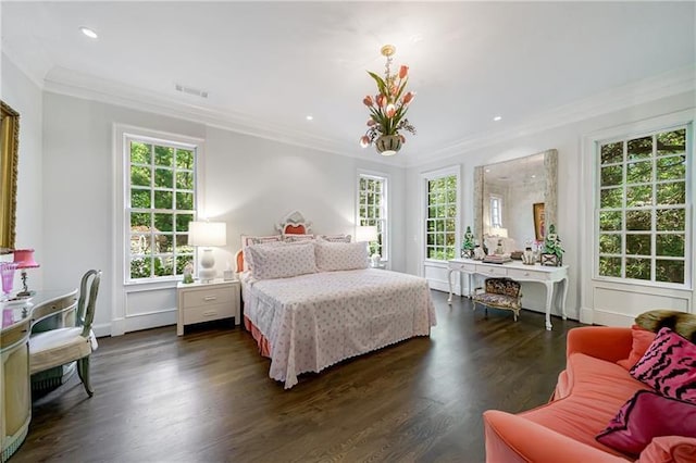 bedroom featuring ornamental molding, dark wood-type flooring, and recessed lighting
