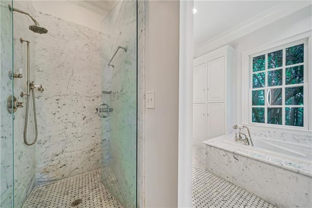 bathroom with ornamental molding, a marble finish shower, a bath, and tile patterned flooring