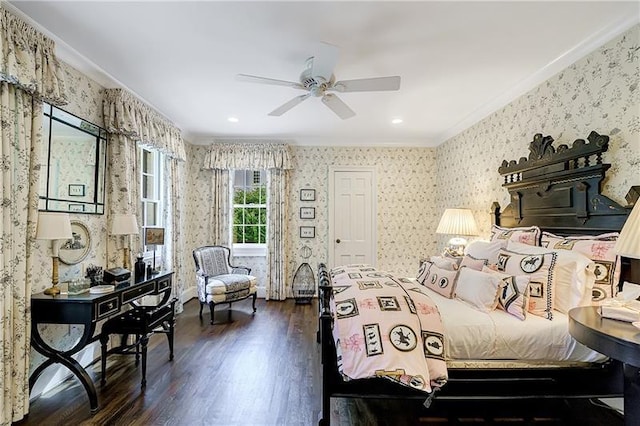 bedroom with wallpapered walls, ornamental molding, wood finished floors, and ceiling fan