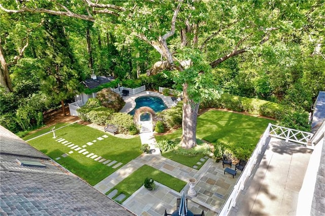 drone / aerial view of a pool