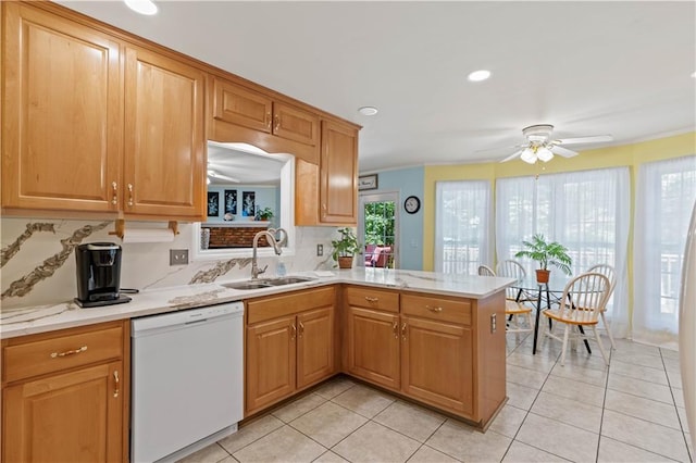 5584 Northwoods Rd, Clermont, GA 30527 - kitchen featuring white dishwasher, a sink, a peninsula, plenty of natural light, and recessed lighting