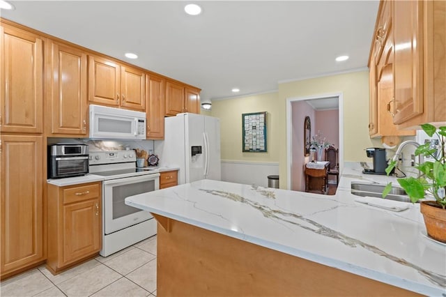 5584 Northwoods Rd, Clermont, GA 30527 - kitchen with white appliances, a peninsula, light tile patterned floors, light stone counters, and recessed lighting