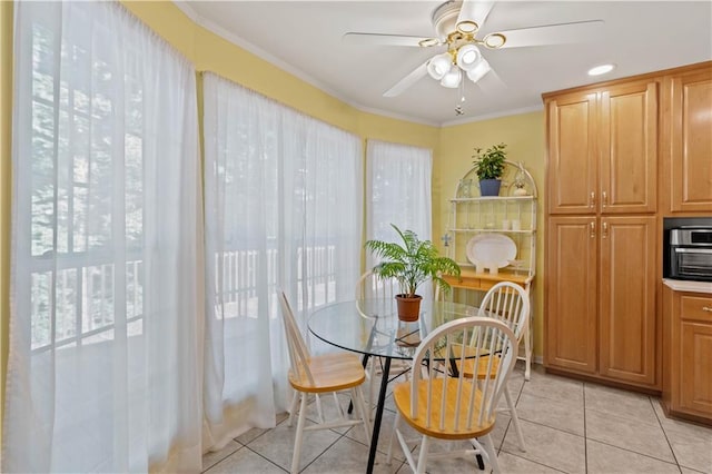 5584 Northwoods Rd, Clermont, GA 30527 - dining space with a ceiling fan, light tile patterned floors, and crown molding