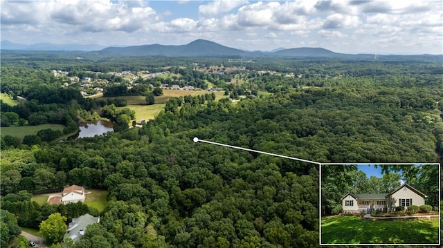 5584 Northwoods Rd, Clermont, GA 30527 - view of property location with a heavily wooded area, property boundaries highlighted, and a mountainous background