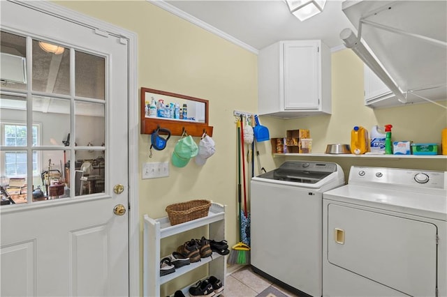 5584 Northwoods Rd, Clermont, GA 30527 - laundry area with cabinet space, washing machine and clothes dryer, light tile patterned floors, and ornamental molding