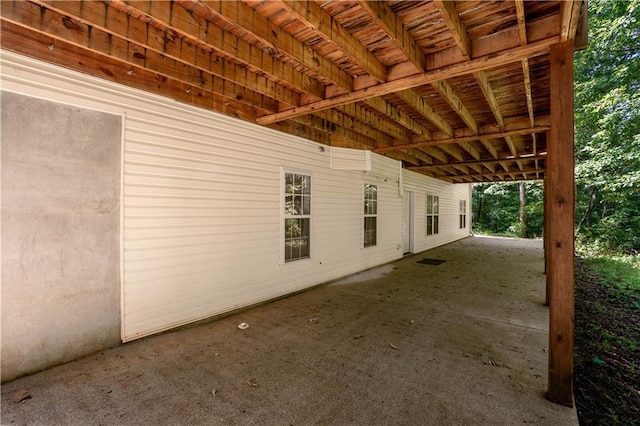 5584 Northwoods Rd, Clermont, GA 30527 - view of patio with an attached carport