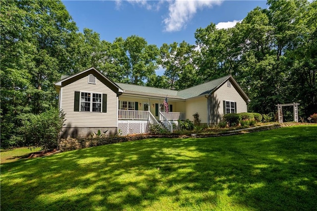 5584 Northwoods Rd, Clermont, GA 30527 - ranch-style house featuring covered porch, a front lawn, and view of scattered trees