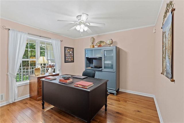 5584 Northwoods Rd, Clermont, GA 30527 - home office featuring light wood-style floors, baseboards, a ceiling fan, and crown molding