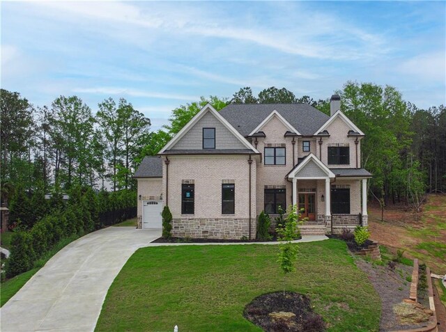 1525 Tapestry Rdg, Lawrenceville, GA 30045 - craftsman-style house featuring a porch, a chimney, a front lawn, concrete driveway, and an attached garage