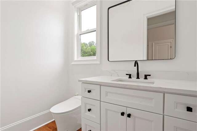 1525 Tapestry Rdg, Lawrenceville, GA 30045 - bathroom featuring vanity, baseboards, and toilet