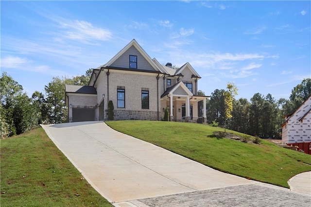 1525 Tapestry Rdg, Lawrenceville, GA 30045 - craftsman-style home featuring an attached garage, concrete driveway, a front lawn, and brick siding