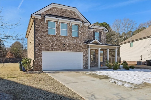 view of front of home featuring brick siding, concrete driveway, and an attached garage