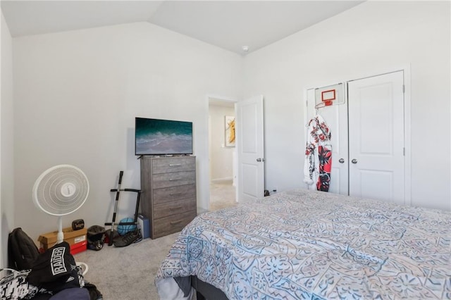 carpeted bedroom featuring vaulted ceiling