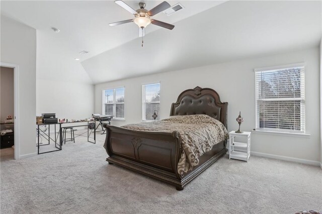 carpeted bedroom with ceiling fan and lofted ceiling