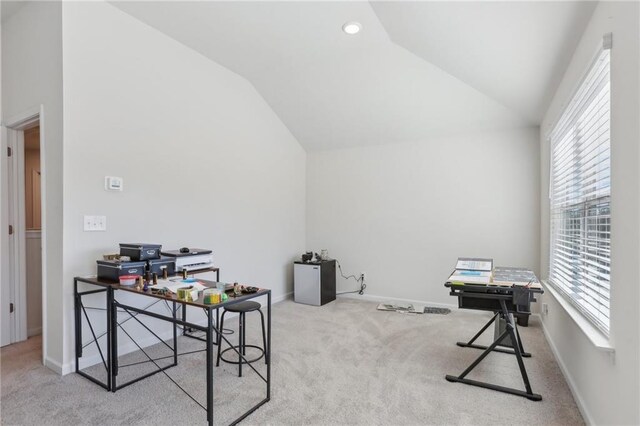 carpeted bedroom with ceiling fan and lofted ceiling