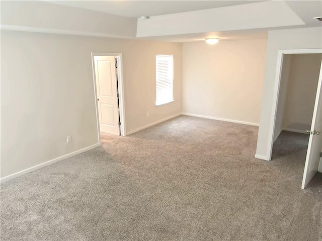 unfurnished room with carpet