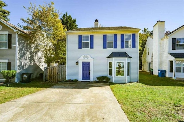 view of front of property with a front lawn