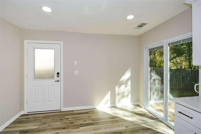 entryway with light wood-type flooring