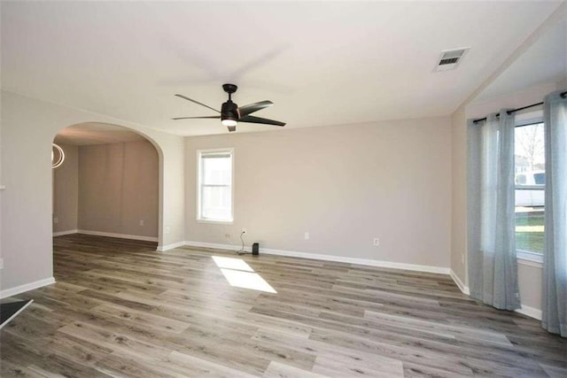 unfurnished room featuring wood-type flooring and ceiling fan