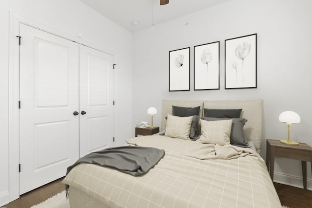 bedroom with ceiling fan, dark hardwood / wood-style flooring, and a closet