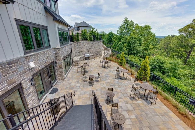 view of patio featuring exterior kitchen