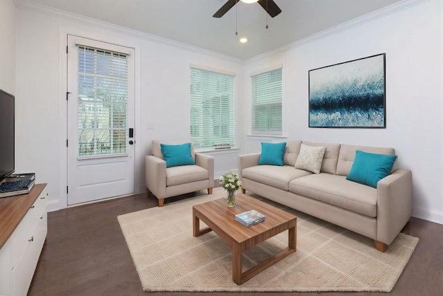 living room with dark hardwood / wood-style flooring and ornamental molding