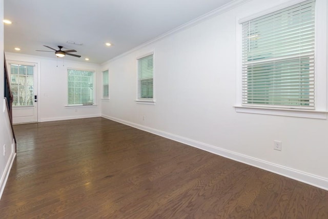 unfurnished room featuring dark hardwood / wood-style flooring, crown molding, and ceiling fan