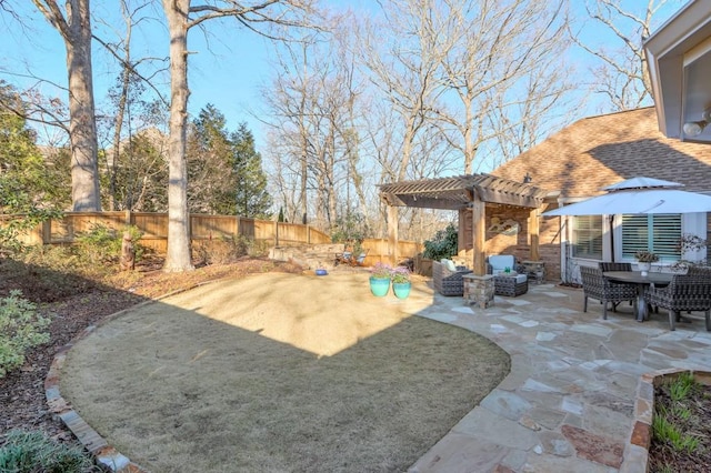 view of patio / terrace featuring outdoor lounge area, a fenced backyard, and a pergola