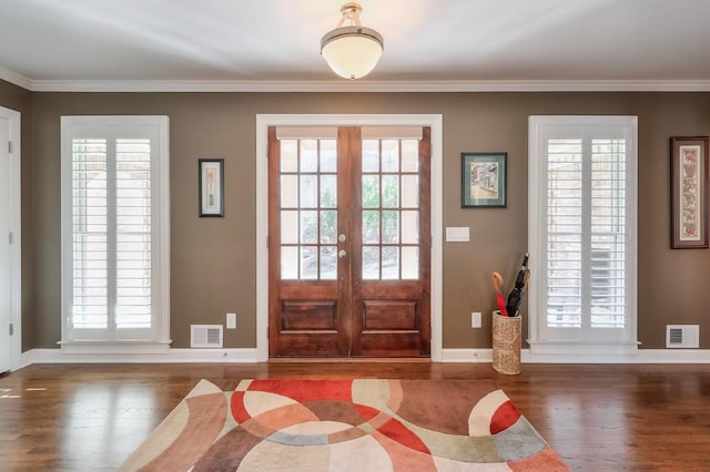 entryway with a healthy amount of sunlight and wood finished floors