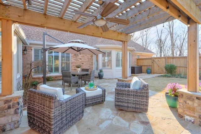 view of patio / terrace with outdoor dining area, fence, a ceiling fan, a gate, and a pergola