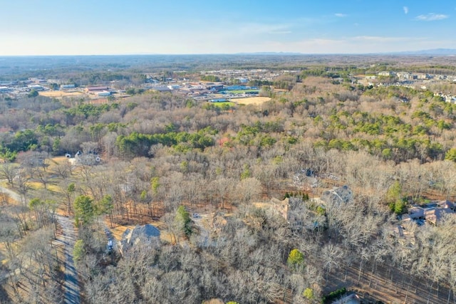 bird's eye view featuring a forest view