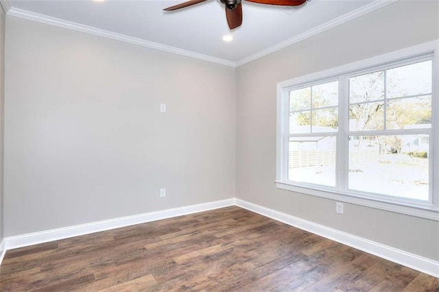 spare room featuring crown molding, ceiling fan, and dark hardwood / wood-style flooring