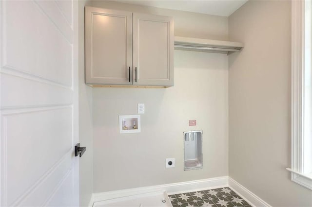 laundry room featuring cabinets, hookup for an electric dryer, and hookup for a washing machine